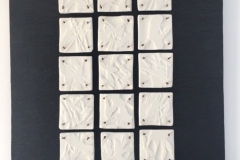 PAPER PORCELAIN TILES WITH RELIEF DECORATION MOUNTED ON BLACK WOOD 38 X 30 CM £180